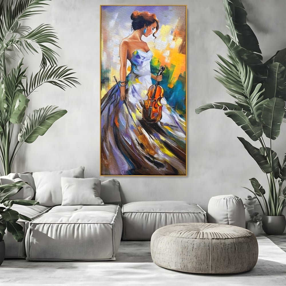 Tablou canvas cu tablou canvas cu femeie si vioara, in rama de aluminiu auriu, pe perete intr-un living